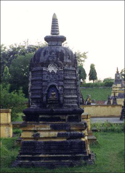 photo of Bodhgaya India - Pilgrims in medieval India made votive gifts (stupas) to temples to show their gratitude to Buddhism or to accumulate merit for their beloved ones.  This tradition continues today in China and throughout the Buddhist world.